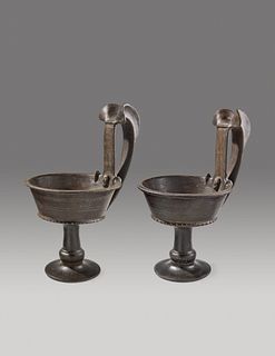 A Pair of Large Etruscan Bucchero Kyathoi
Height 16 1/2 inches.