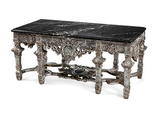 A Regence Style Silvered Wood Center Table
Height 33 x length 74 x depth 38 inches.