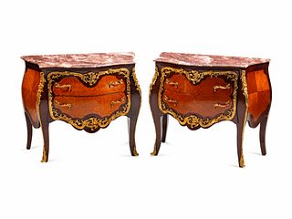 A Pair of Louis XV Style Gilt-Bronze-Mounted Inlaid Kingwood and Tulipwood Commodes
Height 33 x length 39 x depth 21 inches.