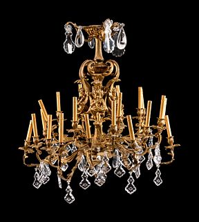 A Louis XV Style Gilt-Bronze and Glass Twenty-Four-Light Chandelier
Height 36 x diameter 35 inches.