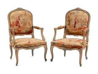 A Pair of Louis XV Style Tapestry-Upholstered and Painted Fauteuils
Height 41 1/2 x width 26 x depth 20 inches.