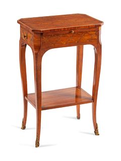 A Louis XV Style Inlaid Table en Chiffoniere
Height 25 1/2 x width 16 x depth 11 inches.