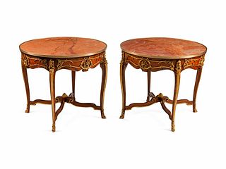 A Pair of Louis XV Style Gilt-Bronze-Mounted Kingwood Tables de Milieu
Height 30 x diameter 35 inches.