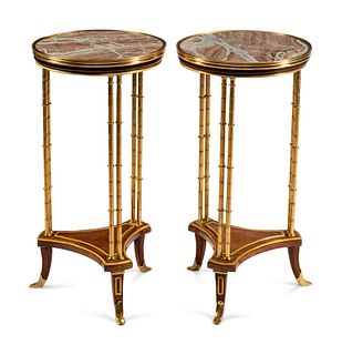 A Pair of Directoire Style Gilt-Bronze-Mounted Mahogany Gueridons
Height 29 1/2 x diameter 15 inches.