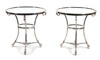 A Pair of Directoire Style Chrome and Mirrored Gueridons
Height 28 x diameter 28 inches.