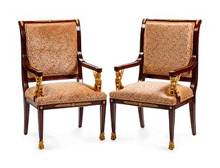 A Pair of Empire Style Gilt-Bronze-Mounted Mahogany Fauteuils
Height 41 x width 25 x depth 20 inches.