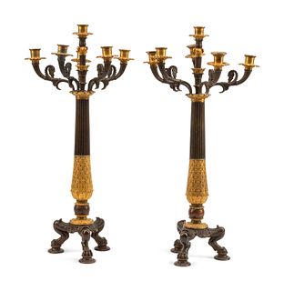 A Pair of Empire Style Parcel-Gilt and Patinated Bronze Six-Light Candelabra
Height 26 x diameter 12 inches.