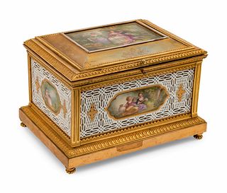 A French Gilt-Bronze-Mounted Porcelain Casket
Height 7 1/2 x length 11 x depth 8 inches.