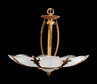 An Art Nouveau Style Gilt-Bronze and Frosted Glass Eight-Light Chandelier
Height 24 x diameter 31 inches.
