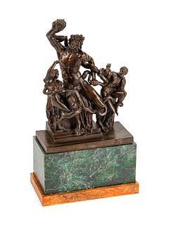 A Continental Patinated Bronze Figural Group: Laocoon and His Sons
Height 25 1/2 x width 14 x depth 7 1/2 inches.
