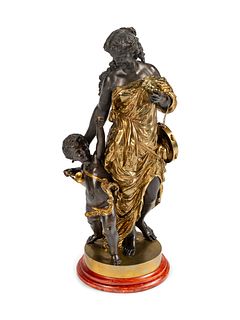 A Parcel-Gilt and Patinated Bronze Large Figural Group
Height 34 x width 15 x depth 12 inches.