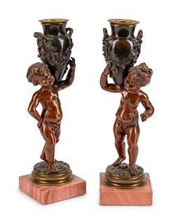 A Pair of French Patinated Bronze Figures of Infant Water Carriers
Height 9 x width 2 1/2 x depth 2 1/2 inches.