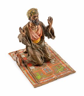 An Austrian Cold-Painted Bronze Figure of a Man in Prayer
Height 5 x width 4 x depth 5 1/2 inches.