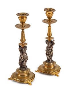 A Pair of Renaissance Revival Part-Silvered Bronze Candlesticks
Height 10 1/2 x diameter 4 inches.