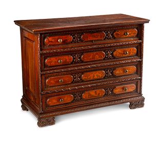 An Italian Baroque Marquetry Chest of Drawers
Height 42 x length 55 1/2 x depth 24 1/2 inches.