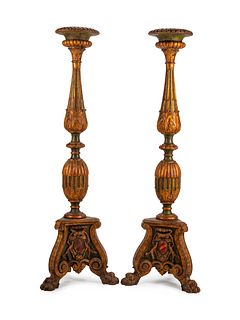 A Pair of Italian Parcel-Gilt and Painted Torcheres
Height 75 x width 25 x depth 25 inches.