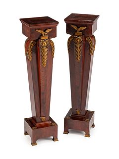 A Pair of Baltic Neoclassical Style Gilt-Bronze-Mounted Mahogany Pedestals
Height 45 x width 10 1/2 x depth 10 1/2 inches.