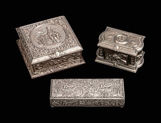 Three Silverplated Boxes
Height 4 x length 8 1/2 x 8 1/2 inches.