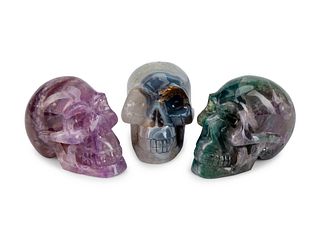 Three Carved Semi-Precious Stone Skulls
Height 5 x width 4 x depth 6 inches.