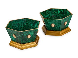 A Pair of Malachite and Giltwood Hexagonal Jardinieres
Height 7 1/2 x length 13 1/2 x depth 13 1/2 inches.