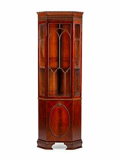 A George III Style Mahogany Corner Cabinet
Height 96 x width 30 x depth 21 inches.