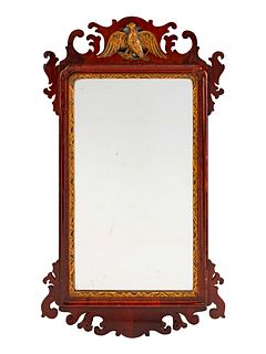 A George III Parcel-Gilt Mahogany Mirror
Height 34 x width 19 inches.