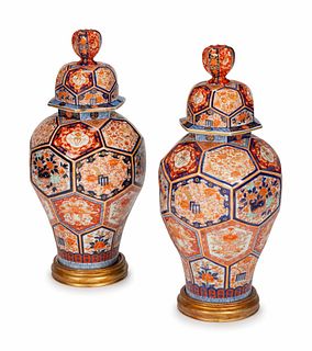 A Pair of Japanese Imari Porcelain Jars and Covers
Height 29 x diameter 13 inches.