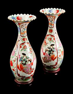 A Pair of Kutani Porcelain Vases
Height 26 x diameter 10 inches.