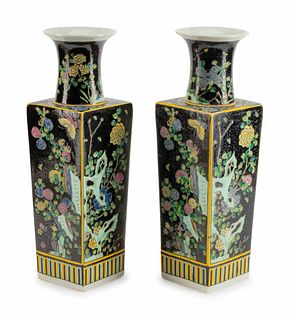 A Pair of Chinese Famille Noir Porcelain Vases
Height 18 1/2 x width 6 x depth 6 inches.