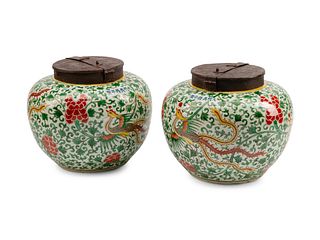A Pair of Chinese Iron-Mounted Porcelain Jars
Height 11 x diameter 12 inches.