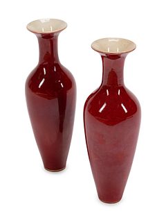 A Pair of Chinese Sang de Boeuf-Glazed Porcelain Shouldered Ovoid Vases
Height 9 x diameter 3 inches.