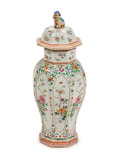 A Chinese Famille Rose Porcelain Octagonal Covered Vase
Height 25 1/2 x diameter 8 1/2 inches.
