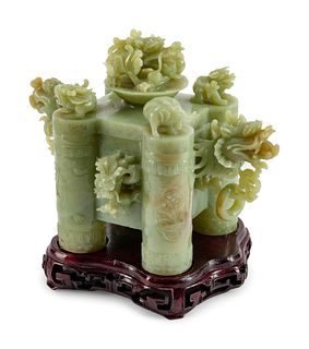 A Chinese Jadeite Incense Burner and Cover
Height 8 1/2 x length 9 1/2 x depth 5 1/2 inches.