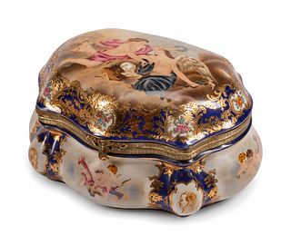 A Sevres Style Bronze-Mounted Porcelain Casket
Height 6 x length 10 x depth 8 inches.