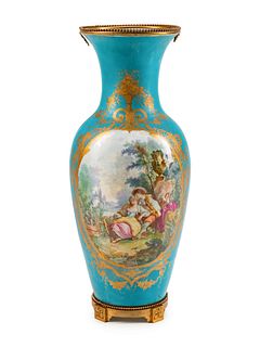 A Large Louis XVI Style Gilt-Bronze-Mounted Sevres Style Porcelain Urn
Height 30 x diameter 12 inches.