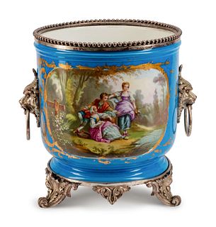 A Silvered Bronze-Mounted Sevres Style Porcelain Jardiniere
Height 12 x diameter 11 inches.
