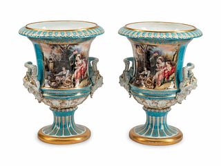 A Large Pair of Continental Porcelain Two-Handled Campana-Form Urns
Height 17 1/2 x diameter 13 inches.