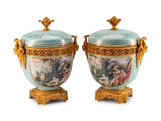 A Pair of Gilt-Bronze-Mounted Sevres Style Porcelain Potpourri
Height 20 x width 15 1/2 x depth 13 inches.