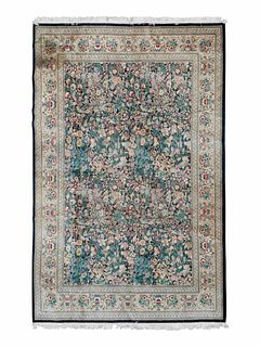 An Indian Wool Carpet
173 x 121 inches.