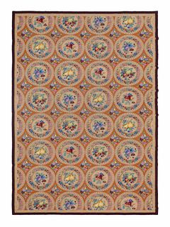 A Large Needlepoint Carpet
144 x 214 inches.