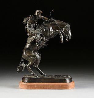 after FREDERIC REMINGTON (American 1861-1909) A BRONZE SCULPTURE, "Bronco Buster,"