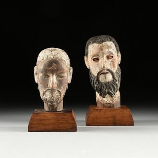 A GROUP OF TWO SANTOS' HEADS, LATE 19TH/EARLY 20TH CENTURY,