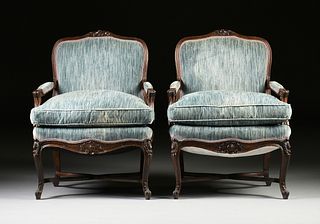 A PAIR OF LOUIS XV STYLE CARVED WALNUT FAUTEUILS A LA REINE, 20TH CENTURY,