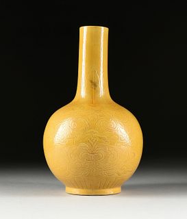 A QING DYNASTY STYLE EGG YOLK YELLOW INCISED BOTTLE VASE, EARLY 20TH CENTURY,