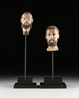 A GROUP OF TWO COLONIAL PAINTED WOOD HEADS OF SAINTS, PROBABLY SPANISH AND FILIPINO, 19TH CENTURY,