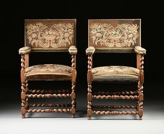 A PAIR OF LOUIS XIII STYLE NEEDLEWORK UPHOLSTERED AND CARVED WALNUT ARMCHAIRS, 19TH CENTURY,