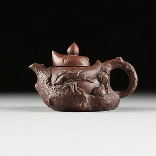 A YIXING ZISHA BUCCARO PURPLE CLAY PEACH FRUIT AND BRANCH FORM TEAPOT, CHINESE, 19TH/20TH CENTURY,