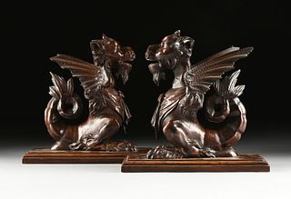 A PAIR OF ITALIAN RENAISSANCE REVIVAL WALNUT DRAGONS, LATE 19TH/EARLY 20TH CENTURY,