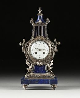 A LOUIS XVI STYLE SILVERED METAL AND LAPIS LYRE FORM MANTLE CLOCK, BY A. CHAPUS, LA GERBE D'OR, LATE 19TH CENTURY, 
