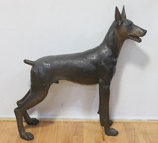 Life Size Patinated Bronze Sculpture Of A Dog.
